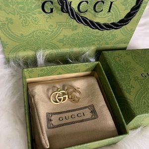 Gucci bronze double GG a earrings.